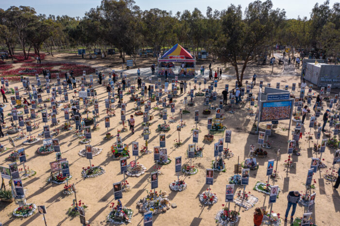 Aerial view of October 7 memorial site with framed photos arranged in rows outdoors in Israel, KKL-JNF Photo Archive